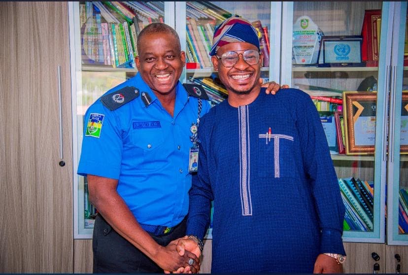 With a senior police officer at a courtesy visit in Abuja