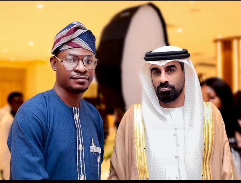 With a visiting dignitary at an engagement in Abuja